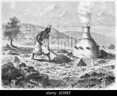 Old illustration of African native extracting iron from minerals in a furnace. Created by Hadamard after Lambert, published on Le Tour du Monde, Paris Stock Photo