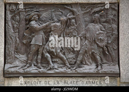 Fighting between European settlers and Fist Nations warriors depicted on the Paul de Chomedey monument in Montreal, Canada. De Chomedy lived from 1612 Stock Photo