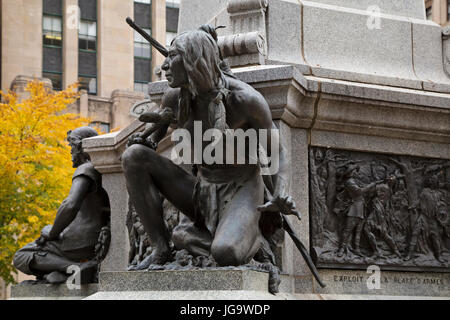 A First Nations warrior depicted on the Paul de Chomedey monument in Montreal, Canada. De Chomedy was the founder of Montreal and the arrival of Europ Stock Photo