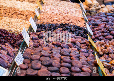 Market, nuts on piles, large quantities in one place, dried apricot, pistachios, asparagus, walnut Stock Photo