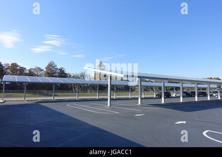 HOUSTON, USA - JANUARY 12, 2017: Some cars parked, with a solar panel protecting from the sun the cars in Legoland park, Legoland is a theme park base Stock Photo