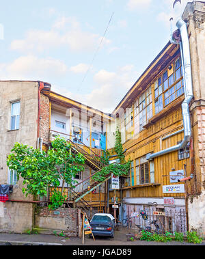 TBILISI, GEORGIA - JUNE 5, 2016: The traditional townhouse nawadays serves as cafe, hotel, art gallery and souvenir store, on June 5 in Tbilisi. Stock Photo