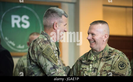 U.S. Army Gen. John W. Nicholson, Commander of the NATO Resolute Support Mission and U.S. Forces–Afghanistan, greets U.S. Army Command Sgt. Maj. John W. Troxell, Senior Enlisted Advisor to the Chairman of the Joint Chiefs of Staff, before a meeting at NATO Resolute Support Mission headquarters in Kabul, Afghanistan, 26 June, 2017. Gen. Dunford traveled throughout the country meeting with U.S., Coalition, and Afghan leaders. (DoD Photo by U.S. Army Sgt. James K. McCann) Stock Photo