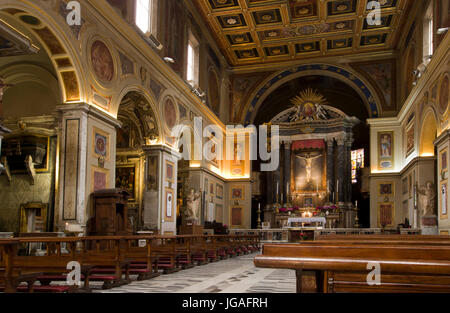 ROME, ITALY -  JUNE 29, 2017: San Lorenzo in Lucina ancient Roman basilica dedicated to St. Lawrence deacon and martyr, the baroque altar in the centr Stock Photo