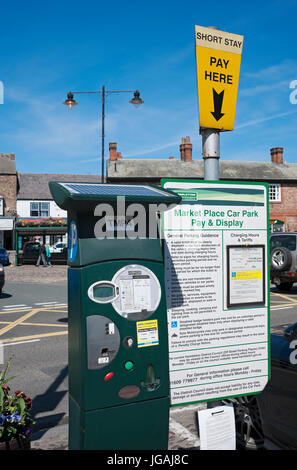 Close up of short stay car park parking ticket machine Market Place Thirsk North Yorkshire England UK United Kingdom GB Great Britain Stock Photo