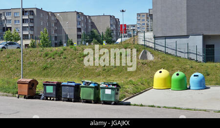Garbage containers for the unassorted and sorted household garbage are installed near houses in the dormitory urban area.  Sorting of garbage allows t Stock Photo