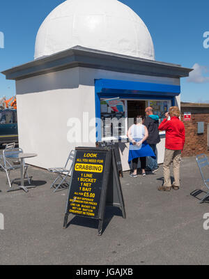 Buying Ice Cream a Kiosk in Fleetwood Lancashire Stock Photo