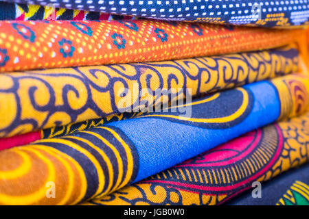 Colorful african fabrics in a shop . Stock Photo