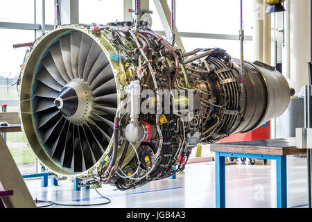 Engine's maintenance in huge industrial hall . Stock Photo