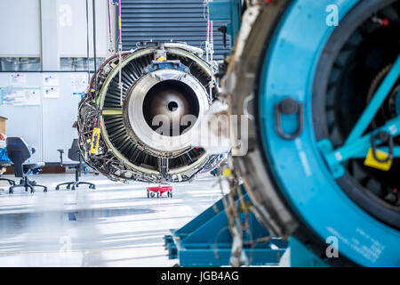 Engine's maintenance in huge industrial hall . Stock Photo