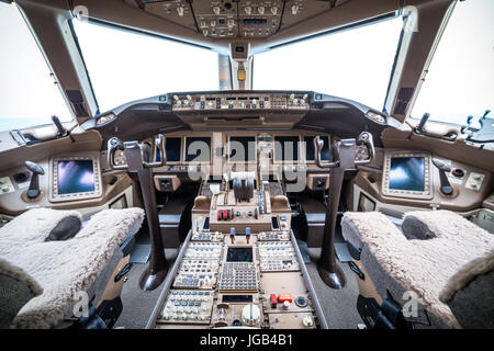 Flight deck in regular airplane. Copy space behind windows. Stock Photo