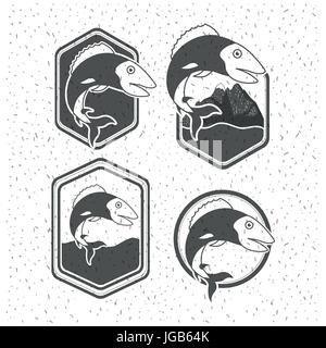 white background with sparkle of silhouette set shield with types of fish in emblem decorative Stock Vector
