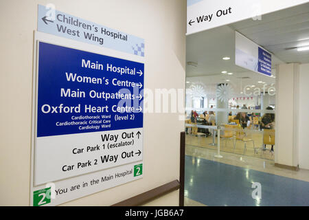 Hospital signs in the interior of the John Radcliffe Hospital, Oxford, England UK Stock Photo