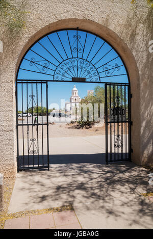 View on San Xavier Mission through the gate , Tucson , Arizona, USA Stock Photo
