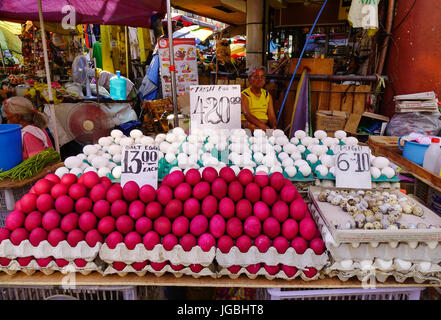 Manila, Philippines - Apr 12, 2017. Selling eggs at market in Manila, Philippines. Manila is the center of culture, economy, education and government  Stock Photo