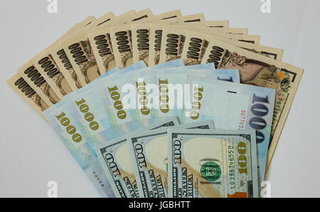 Many kind of banknotes - close up. US dollar, Japan yen and Taiwanese dollar. Stock Photo