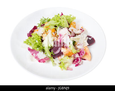 Beet salad with oranges and goat cheese. Isolated on a white background. Stock Photo