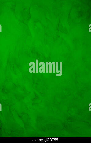Photograph of an original hand-painted background texture in green. Stock Photo