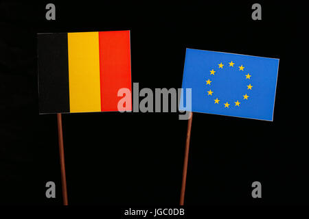 Belgian flag with European Union (EU) flag isolated on black background Stock Photo