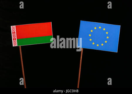 Belarus flag with European Union (EU) flag isolated on black background Stock Photo