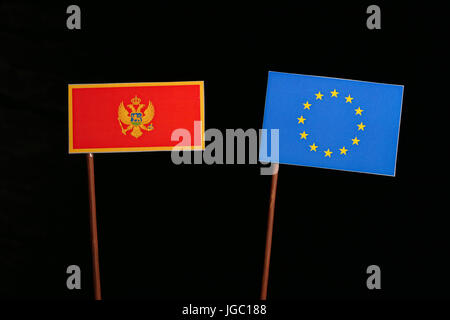 Montenegrin flag with European Union (EU) flag isolated on black background Stock Photo