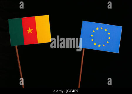 Cameroon flag with European Union (EU) flag isolated on black background Stock Photo