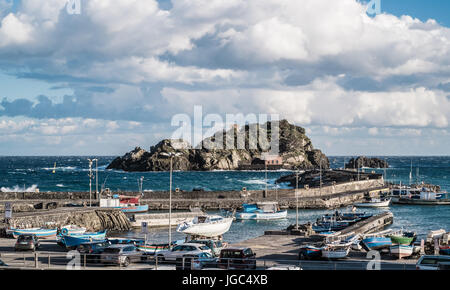 Views of the port of Aci Trezza in a cold and windy winter day Stock Photo