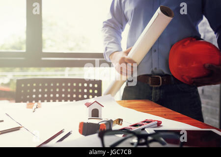 Team of engineers working together in a architect office. Stock Photo