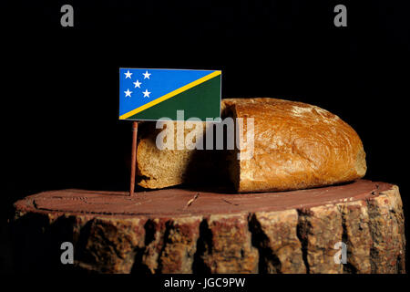 Solomon Islands flag on a stump with bread isolated Stock Photo