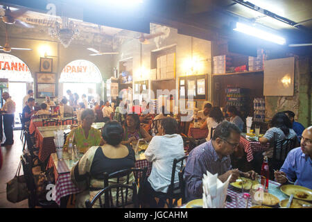 Mumbai, Maharashtra, India. 1st July, 2017. 1 July 2017 : Mumbai - INDIA.Patrons eating at the Britannia Restaurant at Mumbai.As a result of GST Restaurant food has become expensive.The new GST tax, designed to replace India's labyrinth of various levies found across the country's states with a uniform system and unite India into a single market, was launched by the country's prime minister Narendra Modi in a special session of parliament in New Delhi at the stroke of midnight 30 June 2017. Credit: Subhash Sharma/ZUMA Wire/Alamy Live News Stock Photo