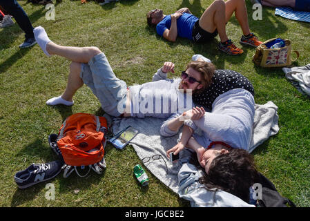 London, UK. 5th July, 2017. People queue for tickets on day three of The Championships at Wimbledon. Many tennis fans have camped overnight in Wimbledon Park to secure a place in the ticket queue. Credit: Stephen Chung/Alamy Live News Stock Photo