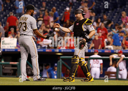 Pittsburgh Pirates relief pitcher Felipe Vazquez, left, celebrates with  catcher Francisco Cervelli after getting the final out of a 2-0 win over  the Cincinnati Reds in a baseball game in Pittsburgh, Friday