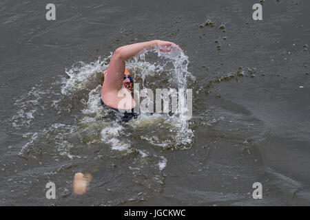 Magdeburg, Germany. 5th July, 2017. Former professional swimmer Helge Meeuw swims in the Elbe river during the first part of the 12th stage passing the state capital of Magdeburg, Germany, 5 July 2017. The squadron started on 24 June 2017 in Bad Schandau and wants to campaign for the significance of clean waters. Photo: Klaus-Dietmar Gabbert/dpa-Zentralbild/dpa/Alamy Live News Stock Photo