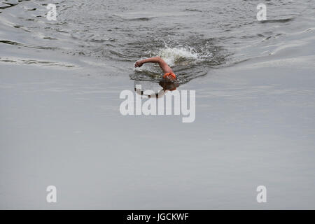 Magdeburg, Germany. 5th July, 2017. Former professional swimmer Helge Meeuw swims in the Elbe river during the first part of the 12th stage passing the state capital of Magdeburg, Germany, 5 July 2017. The squadron started on 24 June 2017 in Bad Schandau and wants to campaign for the significance of clean waters. Photo: Klaus-Dietmar Gabbert/dpa-Zentralbild/dpa/Alamy Live News Stock Photo