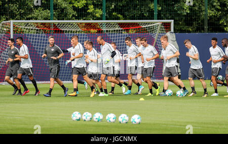 Leipzig, Germany. 6th July, 2017. The team of Bundesliga soccer club RB Leipzig warms up during the first training session at the RB training center in Leipzig, Germany, 6 July 2017. Photo: Jan Woitas/dpa-Zentralbild/dpa/Alamy Live News Stock Photo