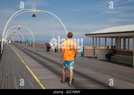 Southport, Merseyside, UK. UK Weather.  6th July, 2017. Bright sunshine in the resort as people and school children, on a day out, enjoy the sunny weather and a walk on the Victorian pier. Credit;MediaWorldImages/AlamyLiveNews Stock Photo
