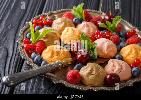 Beautiful biscuits with fresh berries and mint closeup on the table. horizontal Stock Photo
