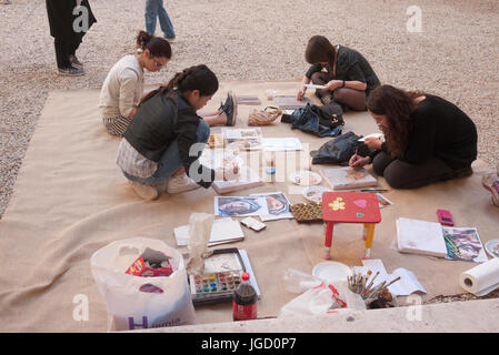 Female art students painting Stock Photo