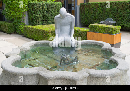 Mission Hill Family Estate,Kelowna, British Columbia, Canada June 21,2017:Journey' is a life size aluminum sculpture sitting in a 17th century Renaiss Stock Photo