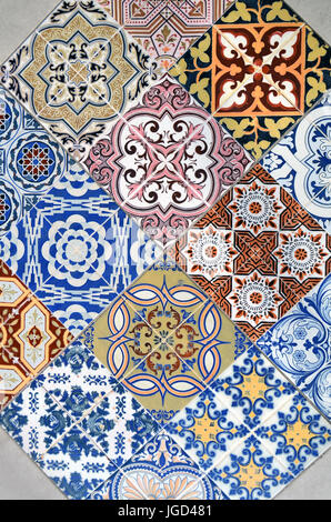 Detail of ornamental ceramic tile with colorful patchwork. Stock Photo