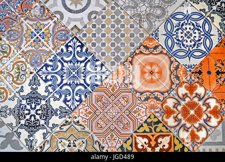 Detail of ornamental ceramic tile with colorful patchwork. Stock Photo