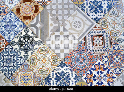 Detail of ornamental ceramic tile with colorful patchwork. Stock Photo