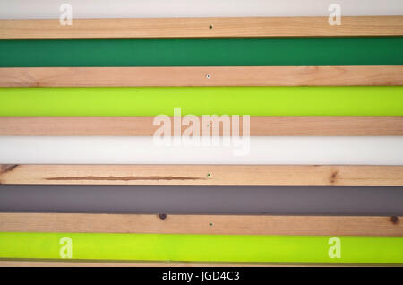 Wooden striped wall background. Green, white, grey, natural planks Stock Photo