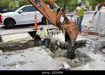 Construction workers laying pipes Stock Photo, Royalty Free Image ...