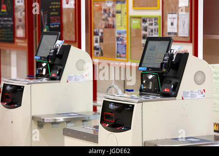 Self service check out till with plastic carrier bags in Fry's food ...