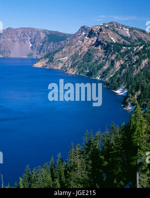 USA, Oregon, Crater Lake National Park, Garfield Peak (right) and Dutton Cliff (left) rise over southern rim of Crater Lake. Stock Photo