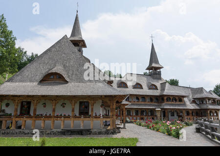 The traditional wooden buildings in the monastery of Botiza in the region of Maramures Stock Photo