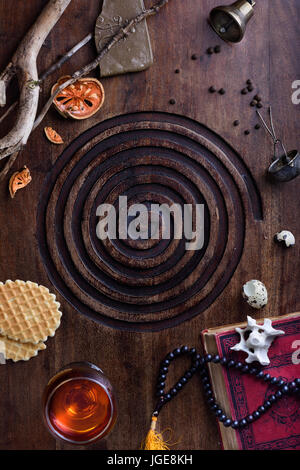 View from above of glass of wine, belgian waffles and spices. Vintage style, boutique hotel menu background. Top view, copy space. Stock Photo