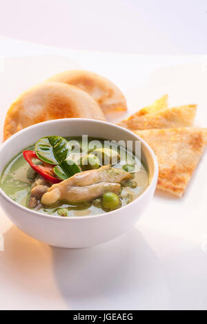 chicken green curry serve with roti flour Stock Photo