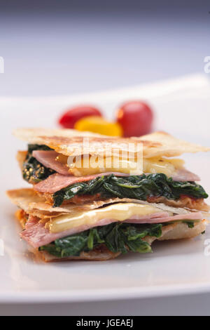 ham cheese and spinach crepes called burek in Balkans region Stock Photo